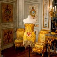 This photograph shows a dress created by Donatella Versace for the fashion house Versace from the Ready-to-Wear 2002-2003 collection displayed at the...