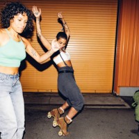 three freestyler on roller skate dancing at night - fashion stock pictures, royalty-free photos & images