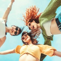 three girlfriends having fun with hands up - fashion stock pictures, royalty-free photos & images