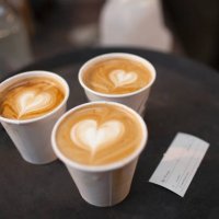 three takeaway cups of coffee with heart shaped tops - junk food stock pictures, royalty-free photos & images