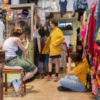 three teenager having fun in a second hand store - fashion stock pictures, royalty-free photos & images