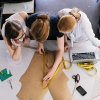 three women fashion designers working with sewing - fashion stock pictures, royalty-free photos & images