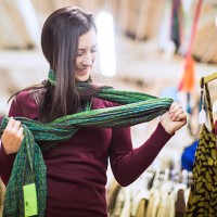 thrift store shopping young woman - fashion stock pictures, royalty-free photos & images