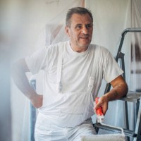 tired mature man house painter - home decoration stock pictures, royalty-free photos & images