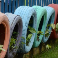 tires - potted plants - garden decoration stock pictures, royalty-free photos & images
