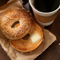 toasted bagel with butter - junk food stock pictures, royalty-free photos & images