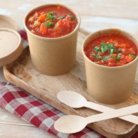 tomato soup in disposable paper cups on a wooden tray with wooden spoons - junk food stock pictures, royalty-free photos & images