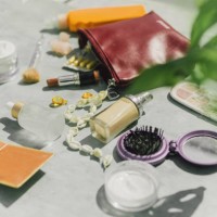 top view cosmetic make-up bag with beauty products - fashion stock pictures, royalty-free photos & images
