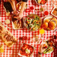 top view of fast food, hands and people at picnic, lunch meal or snack with barbecue, casual cuisine for nutrition and health. diner, cooking and culinary experience with buffet or summer restaurant - junk food stock pictures