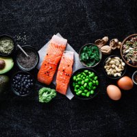 top view of omega 3 food items on black table - food stock pictures, royalty-free photos & images