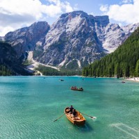 tourism sailing boat in lake braies, dolomite, italy. - travel stock pictures, royalty-free photos & images