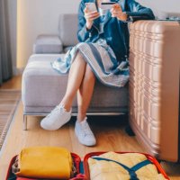 tourist in hotel room flight reservations - travel stock pictures, royalty-free photos & images