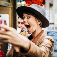 tourist taking selfie while easting an ice cream - food stock pictures, royalty-free photos & images
