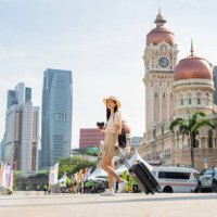 tourist wandering around kuala lumpur - travel stock pictures, royalty-free photos & images