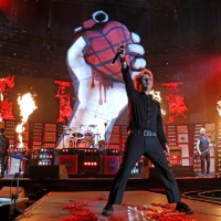 Tré Cool, Billie Joe Armstrong, and Mike Dirnt of Green Day perform onstage as Green Day kicks off their Saviors North America Stadium Tour at...