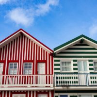 traditional colorful striped houses in costa nova, aveiro, portugal - garden decoration stock pictures, royalty-free photos & images