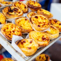 traditional portuguese pastry - pastel de nata - on a market stand - food stock pictures, royalty-free photos & images