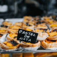 traditional portuguese pastry on window shop - food stock pictures, royalty-free photos & images