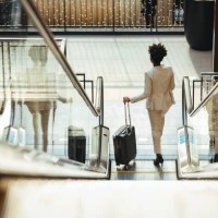 traveler in airport - fashion stock pictures, royalty-free photos & images