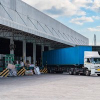truck is carrying container is parking in front warehouse - food stock pictures, royalty-free photos & images