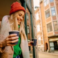 trying out local takeaway coffee - junk food stock pictures, royalty-free photos & images