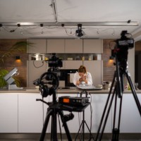 tv set studio kitchen female cook preparing cookies - food stock pictures, royalty-free photos & images
