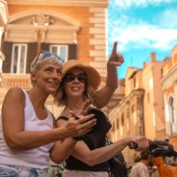two beautiful mature female friends sightseeing in rome - travel stock pictures, royalty-free photos & images