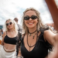 two beautiful senior female friends at a dance event - concert stock pictures, royalty-free photos & images