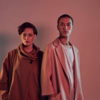 two beautiful young people looking in camera - fashion stock pictures, royalty-free photos & images