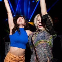 two friends having fun at music event - concert stock pictures, royalty-free photos & images