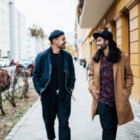 two friends on their way to bar together - fashion stock pictures, royalty-free photos & images