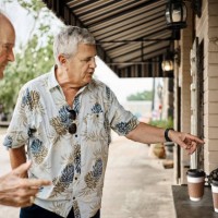 two senior men ordering coffee at restaurant window - junk food stock pictures, royalty-free photos & images