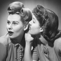 two women gossiping in studio (b&w) - hairstyle stock pictures, royalty-free photos & images