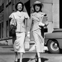 two women walking with packages - fashion stock pictures, royalty-free photos & images