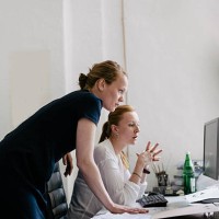two women working in an office - fashion stock pictures, royalty-free photos & images