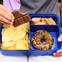 unhealthy school lunch box - junk food stock pictures, royalty-free photos & images