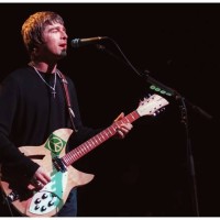 Universal City, CA. Rock group OASIS Noel Gallagher plays to a sell out crowd at the Universal Amphitheatre. Picture by DAN CALLISTER Online USA Inc