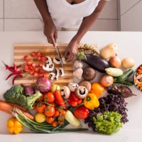 unrecognized women preparing fresh healthy salad. - food stock pictures, royalty-free photos & images