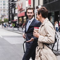 usa, new york city, businessman and woman walking in manhattan - junk food stock pictures, royalty-free photos & images