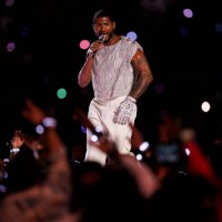 Usher performs onstage during the Apple Music Super Bowl LVIII Halftime Show at Allegiant Stadium on February 11, 2024 in Las Vegas, Nevada.