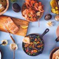 variation of grilled prawns and salmon with fresh lemon - food stock pictures, royalty-free photos & images