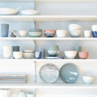 various earthenware on rack in pottery studio - home decoration stock pictures, royalty-free photos & images