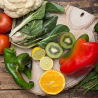 various fruits and vegetables with vitamin c on wood - food photos et images de collection