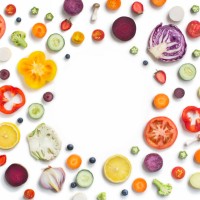 various sliced fruits and vegetables on white background. - food stock pictures, royalty-free photos & images