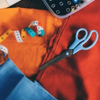 various type of sewing tools on the vibrant linen textile - fashion stock pictures, royalty-free photos & images