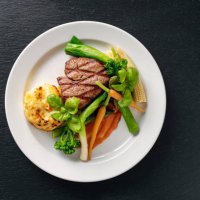veal tenderloin with sesonal vegetables. - food stock pictures, royalty-free photos & images