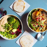 vegan bowls with various vegetables and seeds, high angle view - food stock pictures, royalty-free photos & images