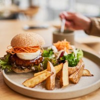vegan cafe's veggie burger lunch plate. - food stock pictures, royalty-free photos & images