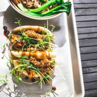 vegan steamed bao buns and ramen - junk food stock pictures, royalty-free photos & images