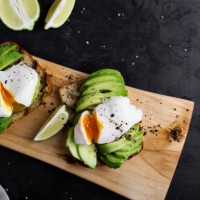 vegetarian sandwiches with poached egg and sliced avocado - food stock pictures, royalty-free photos & images